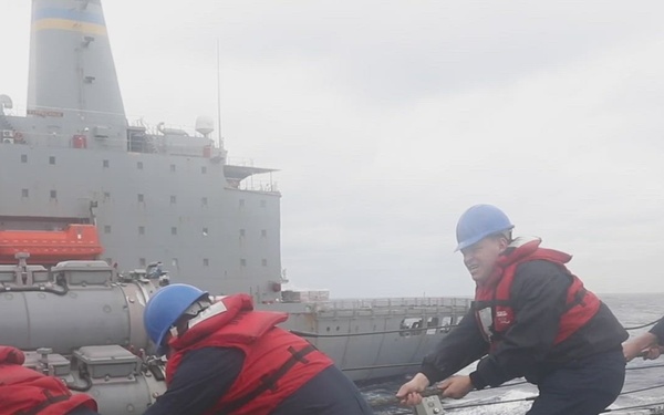Sailors Aboard USS Dewey (DDG 105) Conduct Replenishment-at-Sea with USNS Tippecanoe (T-AO-199)