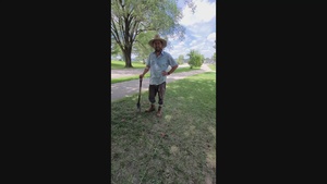 Archaeologist Tyler Olsen explains archaeology work while working special 2022 Fort McCoy dig