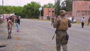 Multinational forces conduct compound assault training