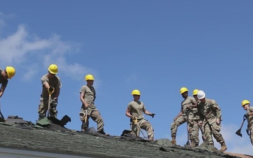 National Guard Soldiers Deschingle Roof