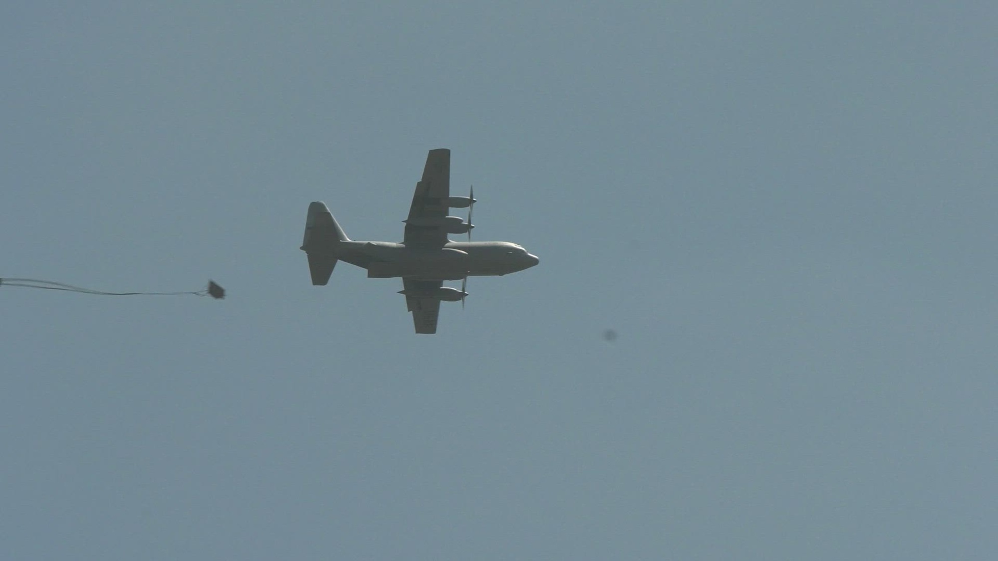 Airmen from the 96th Airlift Squadron and 27th Aerial Port Squadron conducting heavy actual air drops on Warren drop zone at Fort McCoy WI. <br />The units are part of the 934th Airlift Wing at Minneapolis-St Paul Joint Air Reserve Station, Minnesota operating C-130 Hercules aircraft.