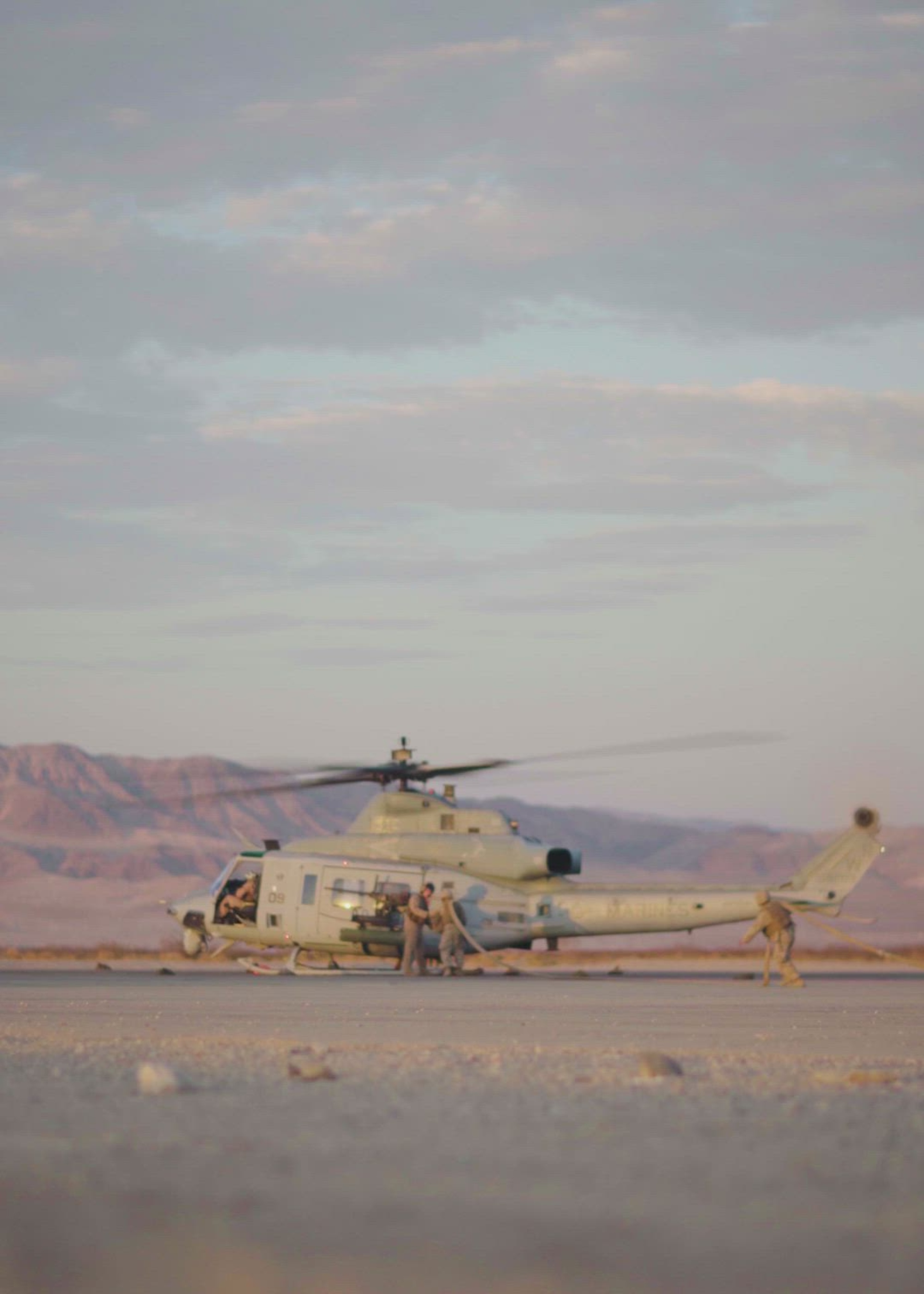 U.S. Marines with Marine Wing Support Squadron 473, Marine Aircraft Group 41, refuel aircraft from Marine Light Helicopter Attack Squadron 775 at a forward arming and refueling point, at Marine Corps Air-Ground Combat Center, Twentynine Palms, Calif., during Integrated Training Exercise 4-22, on July 20, 2022. ITX is the culmination of Marine Forces Reserve units&#39; training cycle as they participate in a live-fire, combined arms exercise as a part of an integrated MAGTF. (U.S. Marine Corps video by Cpl. James Stanfield)