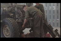 MAGTF-23 Marines perform vehicle maintenance alongside Active Component Marines