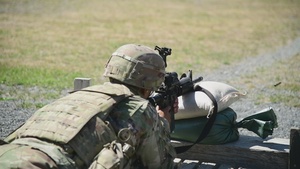 Soldiers zero and fire M4 Carbines at USAREUR-AF Best Squad Competition
