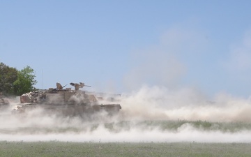 Soldiers fire the Army’s new M1A2 SEPv3 tank on Fort Hood during a training exercise.