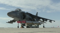 New Tricks For An Old Dog: Marines with VMA-223 load Air-to-Air missiles onto Harriers