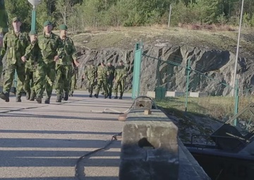 U.S. Marines follow safety demonstrations aboard a Swedish Combat Boat 90