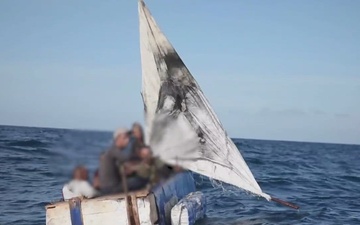 A deployed small boat law enforcement crew from Sector Key West stopped this rustic vessel about 18 miles south of Key West, Florida, Sept 9, 2022. The people were repatriated to Cuba Sept. 11, 2022. (U.S. Coast Guard video by Petty Officer 2nd Class Ronald Hodges)