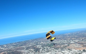 The U.S. Army Parachute Team skydives into Miramar Airshow