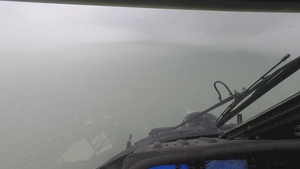 Forward deployed Jayhawk aircrew conducts port overflights