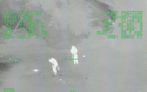 The Coast Guard rescued two people in stormy weather Oct. 1, 2022, after their boat ran onto rocks in Pavlof Harbor, southwest of Juneau. An MH-60 Jayhawk helicopter crew from Air Station Sitka located and hoisted the man and woman and flew them to awaiting EMS in Juneau for medical evaluation. (U.S. Coast Guard video courtesy of Air Station Sitka)