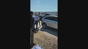 Gov. Ron DeSantis distributes water
