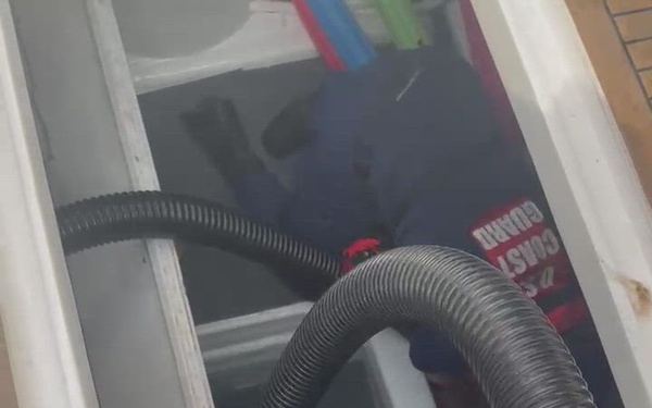 Coast Guard, other agencies rescue 3 people, dog from sinking vessel