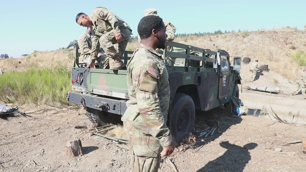 DVIDS - Video - 1-2 SBCT - EFMB - 2022 - Load Casualties onto a Non-standard Vehicle
