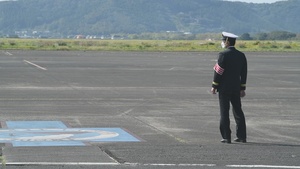 United States Forces Japan deputy commander and 374th Airlift Wing commander arrives at JMSDF Kanoya Air Base for 319th ERS Assumption of Command Ceremony