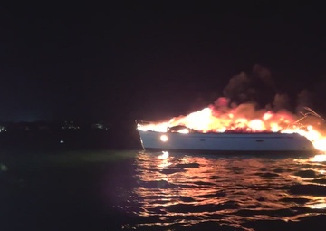 Coast Guard, Key West Fire department fight boat fire off Sunset Key, Florida