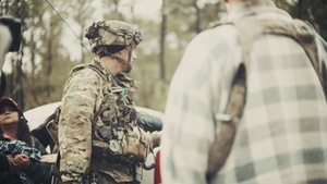 Paratroopers Render Aid to Role Players