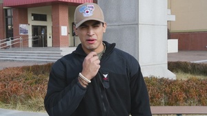 Petty Officer 3rd Class give holiday greeting to family back home