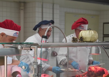 U.S. Ambassador to Japan Rahm Emanuel serves Yokota Airmen Thanksgiving lunch