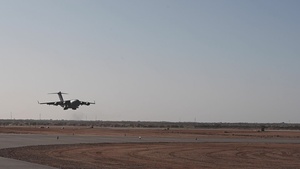 B-roll of a C-17 landing at AB 201