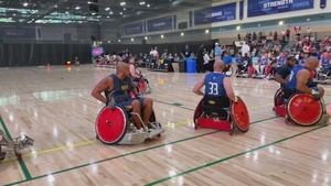 YN2 (Ret.) Aaron Gomez scores in wheelchair rugby