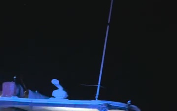 Palm Beach Sheriffs Office officials notified Sector Miami watchstanders of this suspicious 30-foot boat that was taking on water about 8 miles east of Lake Worth Inlet, Florida, Nov. 25, 2022. The people were transferred to Bahamian authorities on Dec. 3, 2022. (U.S. Coast Guard video by Station Lake Worth Inlet's crew)