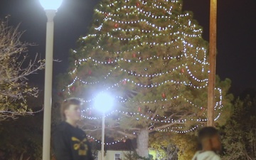 Team Bliss RSO lights post Christmas Tree, celebrates community