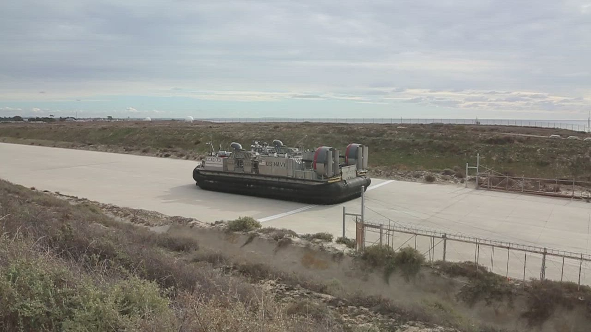 U.S. Marines with Marine Air Support Squadron 3, Marine Air Control Group (MCAG) 38, 3rd Marine Aircraft Wing (MAW), and U.S. Navy Sailors with Assault Craft Unit (ACU) 5, Naval Beach Group 1, load a AN/TPS-80 Ground/Air Task-Oriented Radar onto a landing craft, air cushion during exercise Steel Knight 23, at White Beach, Camp Pendleton, California, Dec. 6, 2022. ACU-5 and MACG-38 demonstrated the ability to use amphibious connectors to quickly reposition aviation command and control Marines and equipment in a littoral environment.  Exercise Steel Knight 23 provides 3rd MAW an opportunity to refine Wing-level warfighting in support of I Marine Expeditionary Force and fleet maneuver.