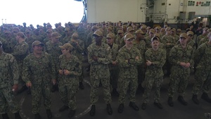 Sailors get frocked aboard Abraham Lincoln