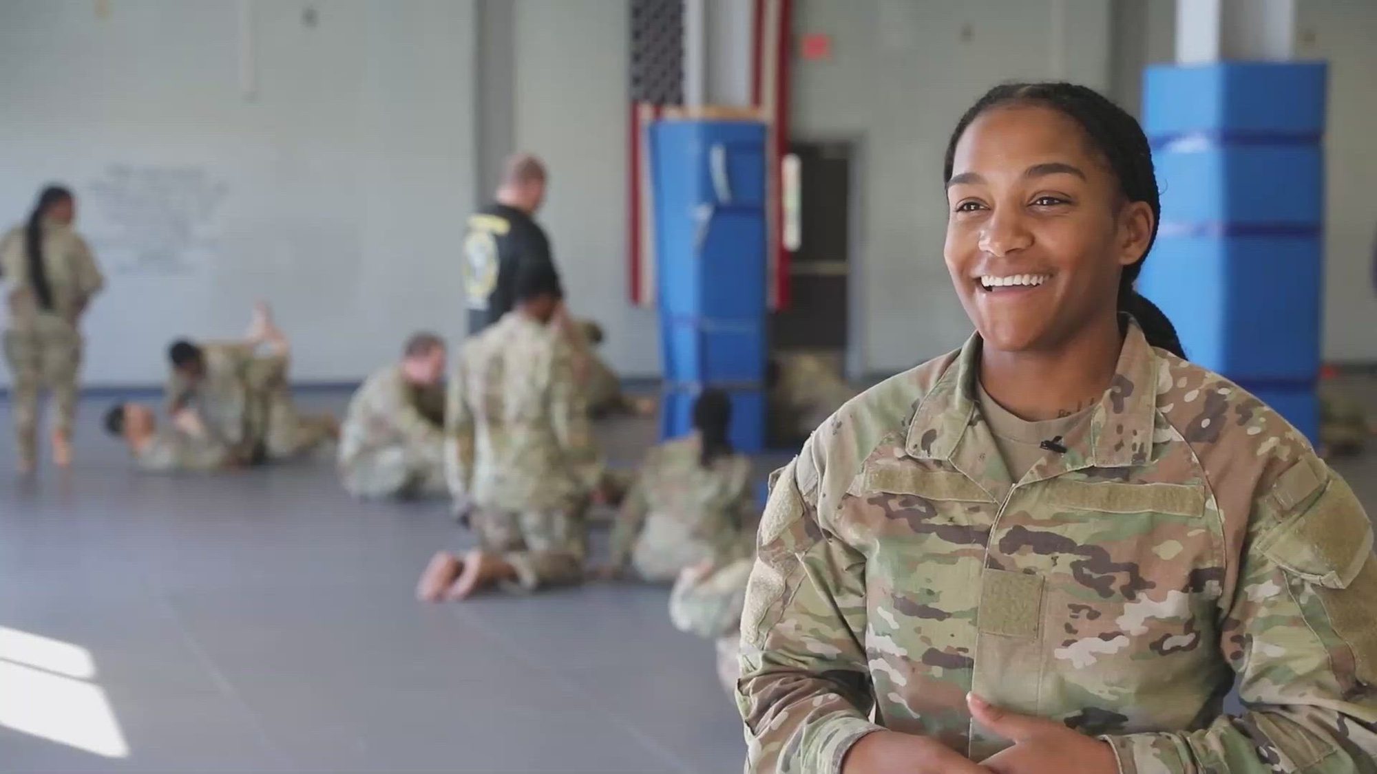 U.S. Army Pfc. Kayla Hernandez, a signal support specialist assigned to the 3rd Infantry Division, speaks on her experience during the level one Modern Army Combatives Course at Fort Stewart, Georgia, March 25, 2022. The combatives course is designed to train Soldiers in close-quarters hand-to-hand combat to develop cohesive and lethal teams. (U.S. Army Video by Pfc. Duke Edwards, 50th Public Affairs Detachment)