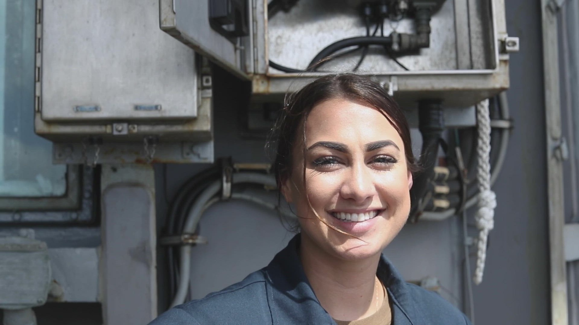 PHILIPPINE SEA (Mar. 13, 2022) Interior Communications Electrician 3rd Class Lauren Ezell, and Lt. Cmdr. Ashly Wisniewski speak about naval heritage in celebration of women's history month. (U.S. Navy video by Mass Communication Specialist 2nd Class Louis Lea)