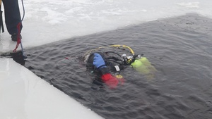 Fort McCoy DES Fire Department dive team holds ice rescue training at frozen lake at Fort McCoy, Part II