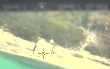 A Coast Guard Air Station Miami HC-144 Ocean Sentry law enforcement aircrew spotted two people waving for help on Angulla Cay, Bahamas, Jan.21, 2023. The people were transferred to Bahamian authorities on Jan. 24, 2023. (U.S. Coast Guard video by Petty Officer 1st Class Nicole J Groll)