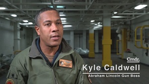 Abraham Lincoln conducts ammunition transfer with Carl Vinson