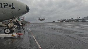 Distinguished Visitors Land Onboard USS Nimitz CVN 68