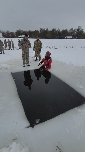 Airmen train in cold-water immersion at Fort McCoy as part of Air-Force-led Cold-Weather Operations Course, Part I
