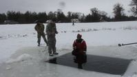 Airmen train in cold-water immersion at Fort McCoy as part of Air-Force-led Cold-Weather Operations Course, Part V