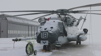 HMH-464 Marines perform maintenance in the snow