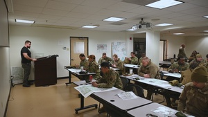 U.S. Air Force Airmen exercise land navigation and vehicle rollover skills