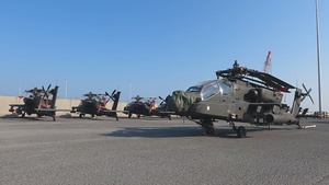 B-Roll AH-64 Apache Helicopters Loaded Onto the Alliance Fairfax, Kuwait 2023