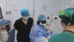 Tech. Sgt. Taylor Johnson Observes Eye Surgery