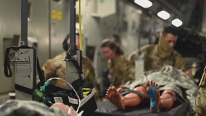 B-Roll of patient offload from C-17 Globemaster III into an ambulance