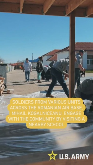 Soldiers in Romania Volunteer at Nearby School