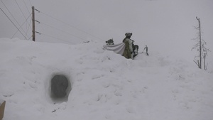 11th Airborne Division Soldiers occupy fighting positions acting as opposing forces during JPMRC-AK 23-02