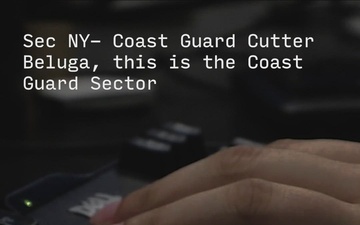 New Coast Guard member conducts radio check with National Parks Service member