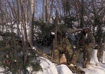 11th Airborne Division Soldiers construct winter fighting positions during JPMRC-AK 23-02