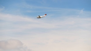 Air National Guard C-130Hs and U.S. Forest Service lead planes practicing MAFFS water drops (1of2)