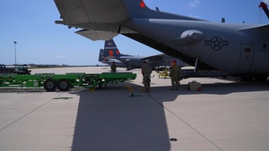 Airmen offload Modular Airborne Fire Fighting System (MAFFS) from C-130H during 2023 MAFFS Spring training