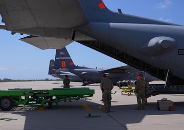 Airmen offload Modular Airborne Fire Fighting System (MAFFS) from C-130H during 2023 MAFFS Spring training