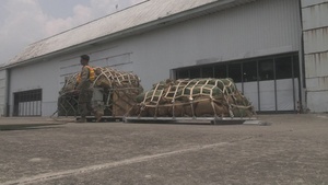 U.S. Marines Onload Personnel and Gear on to a C-130 Hercules During Balikatan 23
